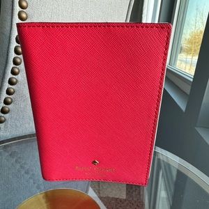 Kate spade passport holder in coral